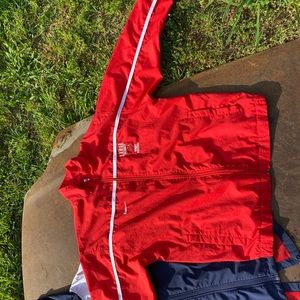 Nike’s red windbreaker